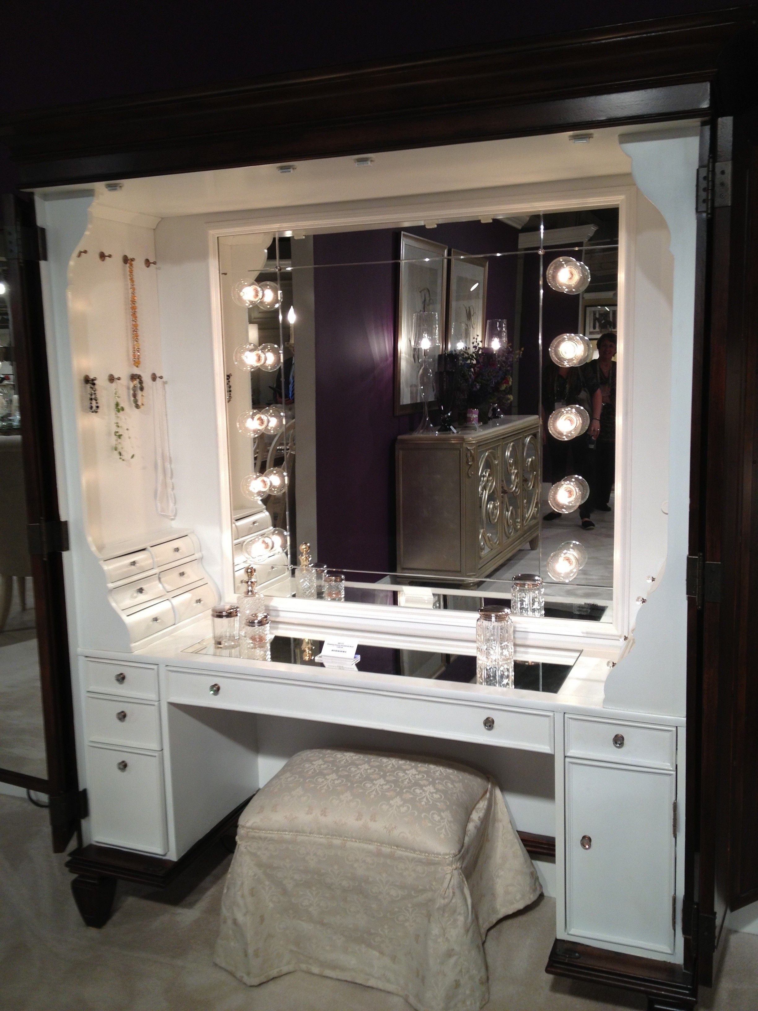 white vanity table with lighted mirror