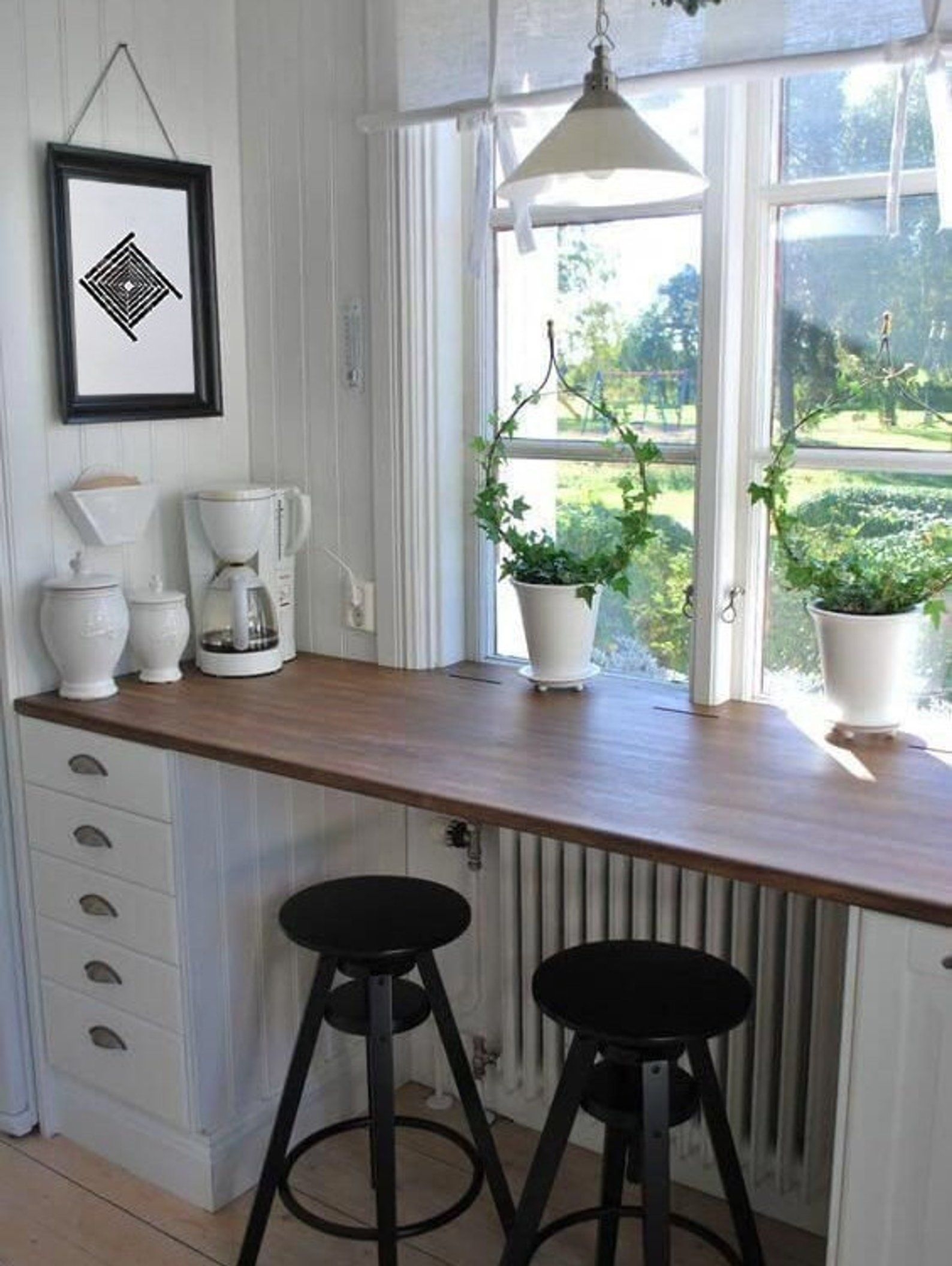 breakfast bar with storage and stools