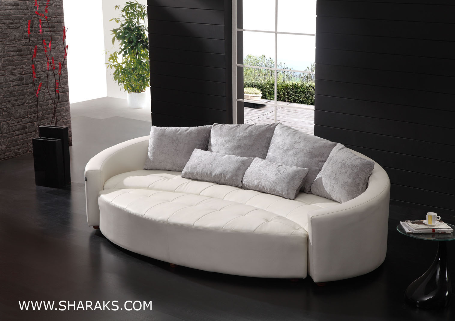 curved tufted leather sofa