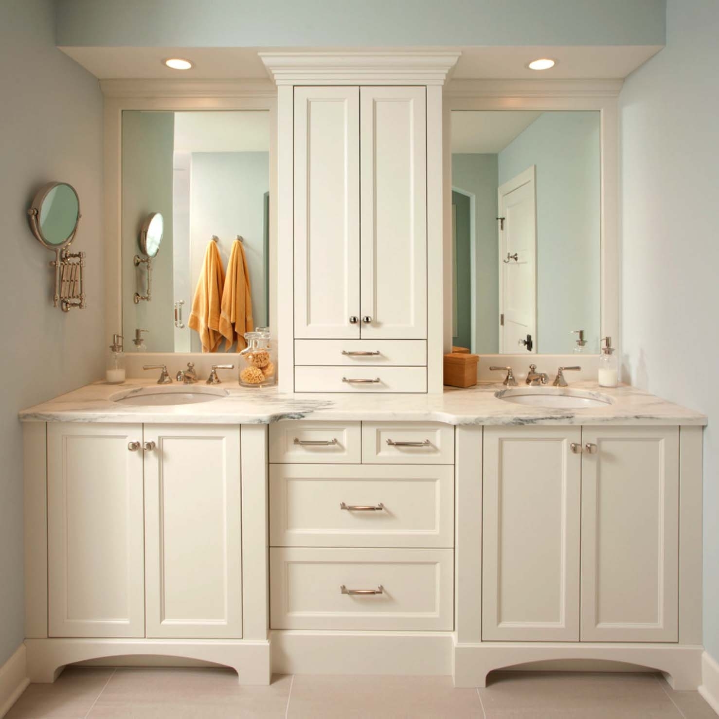 Bathroom storage tower between sinks