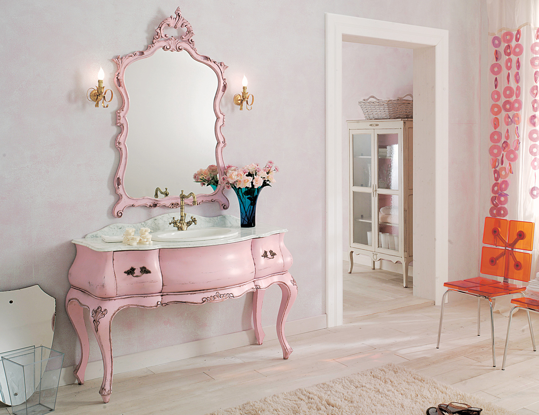 pink bedroom with brown furniture