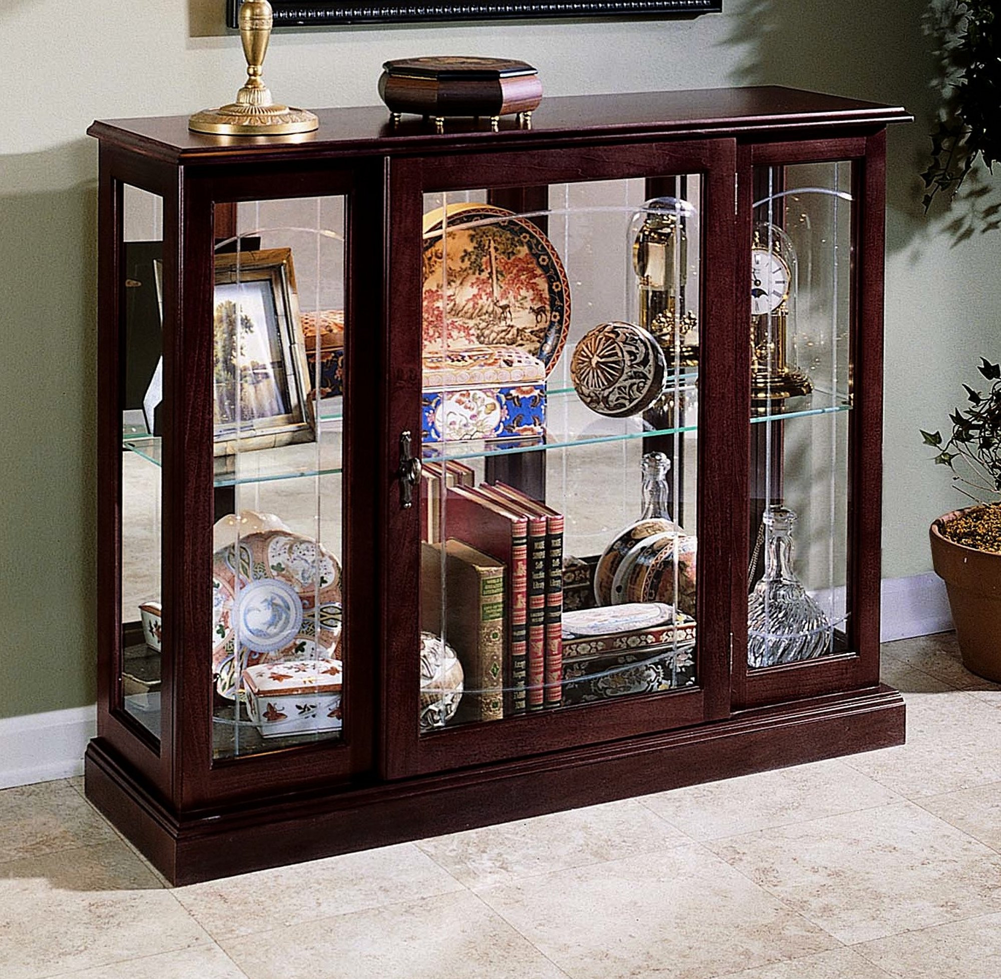 Small curio cabinet with glass deals doors